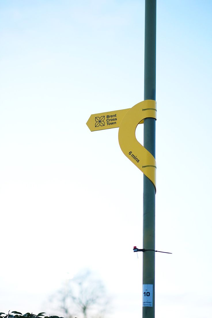 a pole with a street sign attached to it