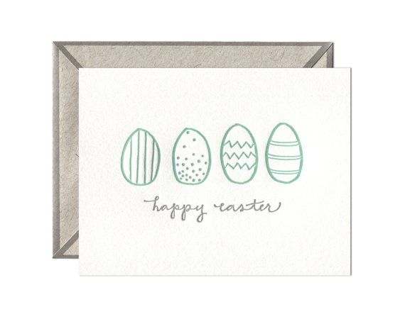 an easter card with three eggs on it and the words happy easter written in green ink