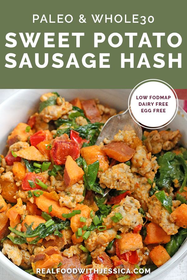 a bowl filled with sweet potato sausage hashbrowns and topped with spinach