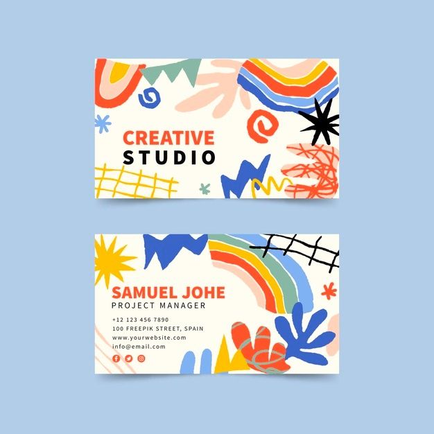 two business cards designed to look like art with colorful abstract shapes and lines on them