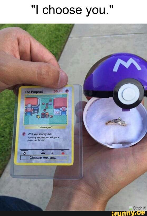 someone is holding a pokemon card with a ring on it's finger and an object in the other hand