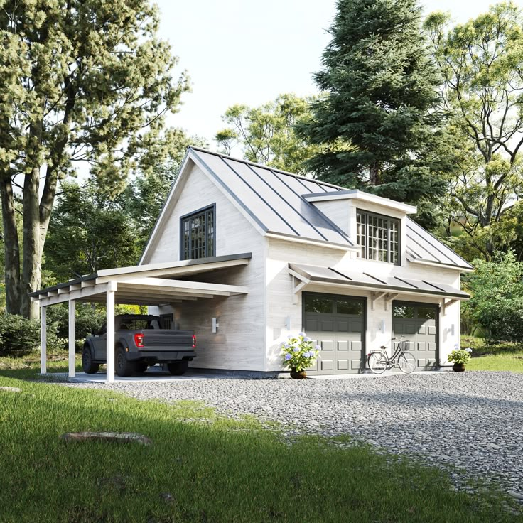 a car is parked in front of a garage on the side of a road with trees and grass