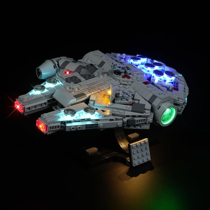 a lego light up model is shown in the dark with its lights on and it's glowing