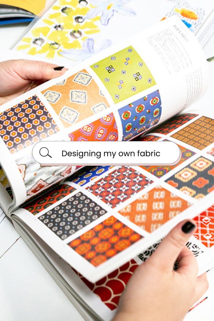 someone is designing their own fabric book