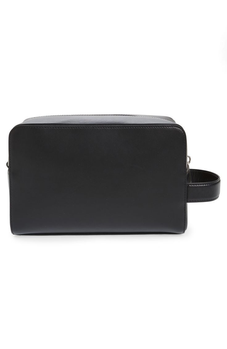 The label's tongue-in-cheek quotations continue on a sleek leather pouch that makes its purpose abundantly clear. Top zip closure Side handle Interior wall pocket Leather Made in Italy Designer Handbags Black Owned/Founded Classic Black Bag With Zipper Pouch, Designer Rectangular Pouch For Everyday Use, Modern Black Pouch For Formal Occasions, Classic Rectangular Pouch For Daily Use, Classic Formal Rectangular Pouch, Classic Pouch With Zipper For Daily Use, Modern Business Bag With Zipper Pouch, Modern Business Cases With Zipper Pouch, Modern Rectangular Pouch For Office