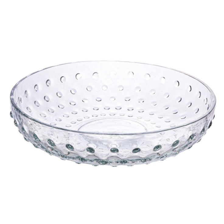 a glass bowl with holes in it