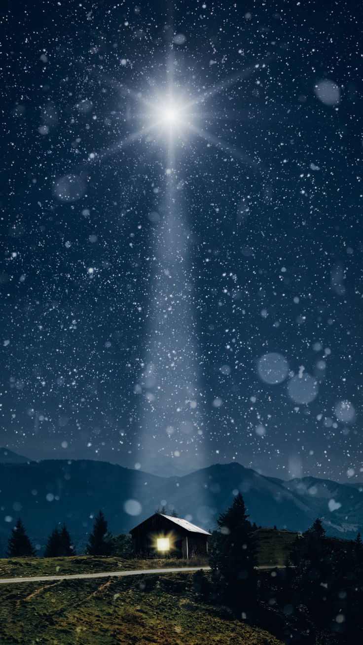 an image of the birth of jesus in the night sky with stars and snow falling on it