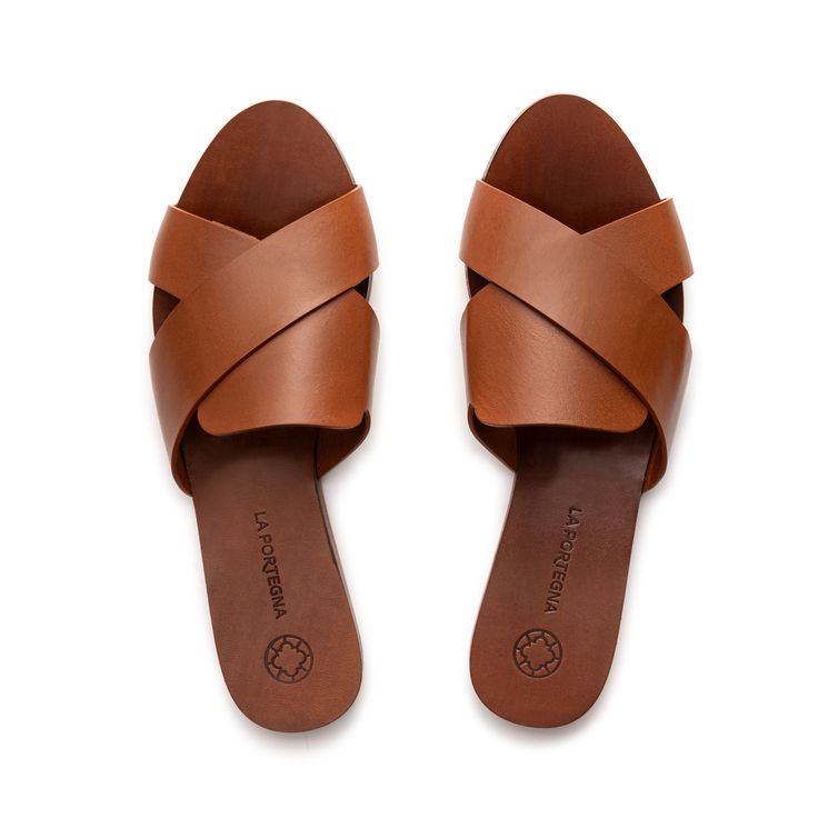 Our new Anna flat sandals made of leather are the perfect option to keep your feet cool on hot summer days.  *One size larger than usual is recommended.   La Portegna leather is vegetable tanned, with a unique blend of natural tannins and compounds from flowers and tree bark. The leather is treated with olive oil to nourish it, soften it and make it more robust.   This all-natural process has two benefits: it results in beautiful-looking leather that develops a unique "patina" over time; it lit Tree Bark, Hot Summer, Flat Sandals, Wallet Men, Summer Days, Olive Oil, Bags Women, Men's Shoes, Bag Lady