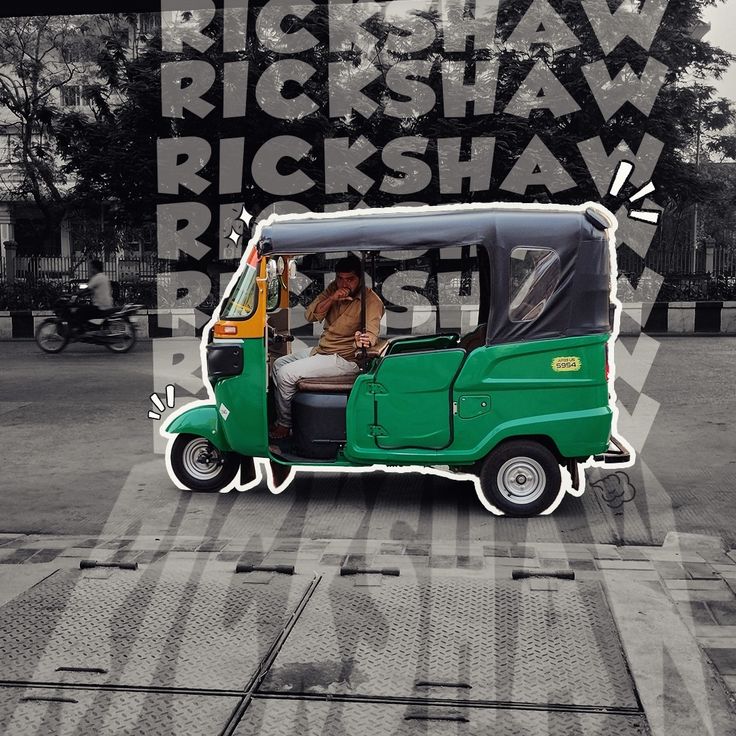 a man driving a green rickshaw on the street