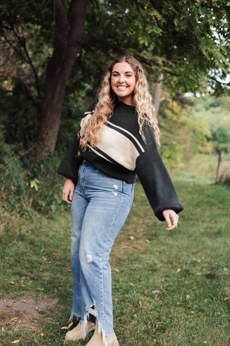 This cozy sweater is so soft, a little bit oversized, and looks like the perfect vintage sweater! We can't get enough of this one, available in two colors! Model is wearing a large Cozy Relaxed Fit Cropped Sweater For Fall, Soft Knit Turtleneck Cropped Sweater For Fall, Trendy Relaxed Fit Sweater For Fall, Oversized Cropped Sweater With Ribbed Cuffs For Fall, Oversized Trendy Sweater For Cold Weather, Comfy Sweater For Cold Weather And Fall, Trendy Relaxed Fit Cropped Sweater For Winter, Fall Turtleneck Cropped Sweater In Soft Knit, Trendy Cozy Fit Sweatshirt For Fall