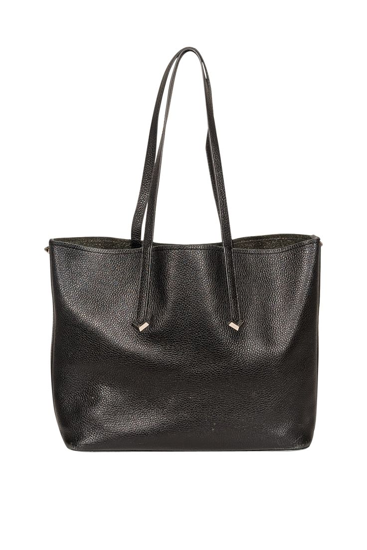 Get your style game on with Botkier's black pebbled leather tote bag! Whether you're at the office or out and about, this modern minimalist bag is the perfect accessory. Stay on-trend while carrying all your essentials in one chic package. 100% Leather Open top Silver hardware detail Shoulder straps Wear on interior and base/corners Comes with dustbag Height 11.25" Width 13" Depth 5.25" Strap drop 11" Minimalist Bag, Black Leather Tote Bag, Black Pebbles, Out And About, Game On, Open Top, Black Tote Bag, Leather Tote Bag, Silver Hardware