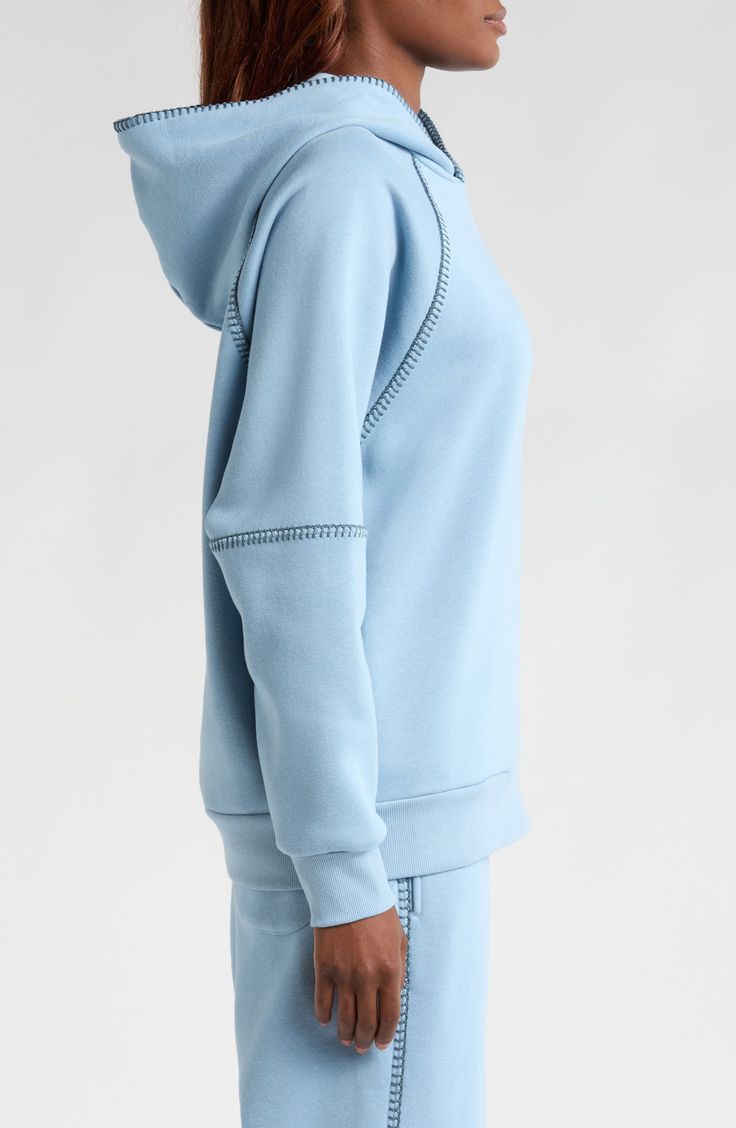 Chunky blanket stitching lends cozy flair to this cotton-blend hoodie. 28" length (size Small) Fixed hood Ribbed cuffs and hem Side-seam pockets 55% cotton, 45% recycled polyester with 96% cotton, 4% elastane trim Machine wash, tumble dry Imported Cotton Hooded Jacket With Ribbed Cuffs For Loungewear, Relaxed Fit Sweats With Double-lined Hood For Spring, Comfy Cotton Sweats With Double-lined Hood, Spring Hooded Sweats With Double-lined Hood, Cotton Hooded Jacket With Kangaroo Pocket For Loungewear, Comfy Cotton Hooded Jacket With Drawstring, Spring Hoodie Sweats With Pockets, Cozy Cotton Hooded Sweats, Cozy Cotton Hooded Jacket In Solid Color