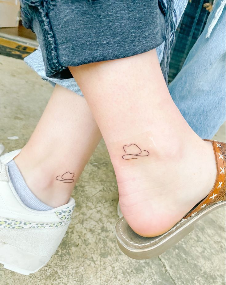 Cowboy hat, ankle, simple tattoo, small tattoo, best friend Matching Tattoos Cowboy Hat, Small Cowboy Hat Tattoos, Cute Nashville Tattoos, Cowboy Hat And Boots Tattoo Matching, Small Cowboy Hat Tattoos For Women, One Line Cowboy Hat Tattoo, Small Nashville Tattoo, Nashville Friend Tattoos, Matching Nashville Tattoos