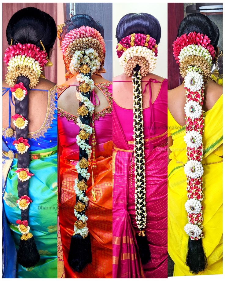 three women in different colored saris with flower garlands on their heads and hair