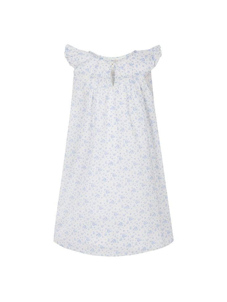 Created from ST. CLAIR's deadstock fabric & made in collaboration with RISE, this little night dress is cut in the softest single layer GOTS certified 100% organic cotton voile fabric. Loose fitting & floaty, with a simple yoke shape, pretty ruffle shoulders & a dainty mother of pearl front fastening. These nighties are breathable, natural & lightweight. They are sized generously with the intention to last fast growing little girls a good few years. Almost too pretty just to sleep in! Indigo Bouquet is a sophisticated take on a traditional summer floral featuring a bold bouquet of daisies, soft yellow buttercups, periwinkle delphiniums, blousy red poppies & pink roses on an indigo blue background. All ST. CLAIR prints are unique, painted in England by hand in watercolour & inspired by the Cotton Summer Nightgown For Bedtime, Summer Cotton Nightgown For Bedtime, Spring Cotton Bedtime Dress, Spring Cotton Dresses For Daywear, Cotton Summer Night Dresses, Summer Night Cotton Dresses, Cotton Summer Dresses For Night, Blue Cotton Nightgown For Spring, Cotton Summer Nightgown