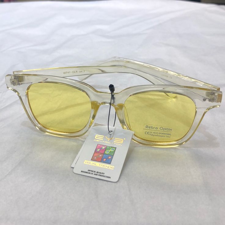 Clear/Yellow Sunglasses Yellow Square Frame Sunglasses For Beach, Yellow Plastic Sunglasses For Summer, Casual Clear Sunglasses For Spring, Yellow Sunglasses With Uv Protection For Vacation, Yellow Mirrored Sunglasses For Summer, Summer Yellow Sunglasses With Mirrored Lenses, Yellow Sunglasses With Uv Protection For The Beach, Yellow Sunglasses With Uv Protection For Beach, Yellow Polarized Sunglasses For The Beach