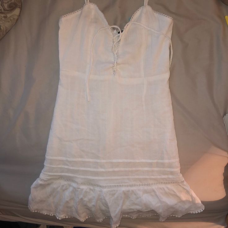 White Dress With Lace Up Top And Super Cute Detailing On The Bottom. There’s A Lining On The Inside So It’s Not See Through! Very Flattering On!! Never Worn :) Casual Lace Trim Dress For Date Night, Casual Dress With Lace Trim For Date Night, Casual Midi Dress With Lace Trim For Date Night, White Cotton Sundress For Date Night, White Dress With Lace, Lace Up Top, Dress With Lace, Lace Dress, Colorful Dresses