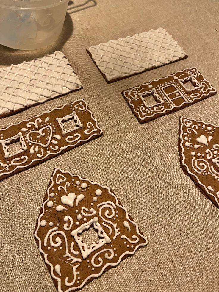 some cookies are laying out on the table to be made into coasters for someone's birthday