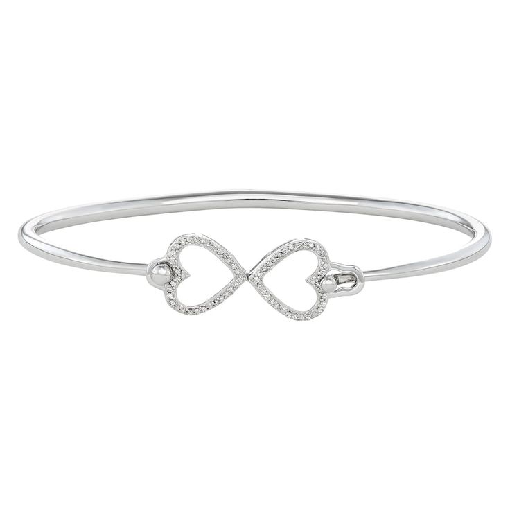 "Fall in love with the timeless style of this diamond heart bangle bracelet. Fall in love with the timeless style of this diamond heart bangle bracelet. Packaging: boxed Base material: sterling silver Bracelet length: 7 in. Plating: 10k white gold plated, platinum Finish: polished Nickel free DIAMOND DETAILS Setting; prong Total weight: 1/6 ct. Color grade: H-I Clarity: I1-I2 Size: 7"". Gender: female. Age Group: adult." Stackable Diamond Bracelet For Anniversary, White Gold Diamond Heart Bracelet, Classic White Gold Diamond Heart Bracelet, Classic Bangle With Single Diamond For Anniversary, Classic Single Diamond Bangle For Anniversary, Classic Anniversary Bangle With Single Diamond, Classic Diamond Heart Bracelet In White Gold, Valentine's Day White Gold Heart Diamond Bracelet, Valentine's Day Heart-shaped White Gold Diamond Bracelet