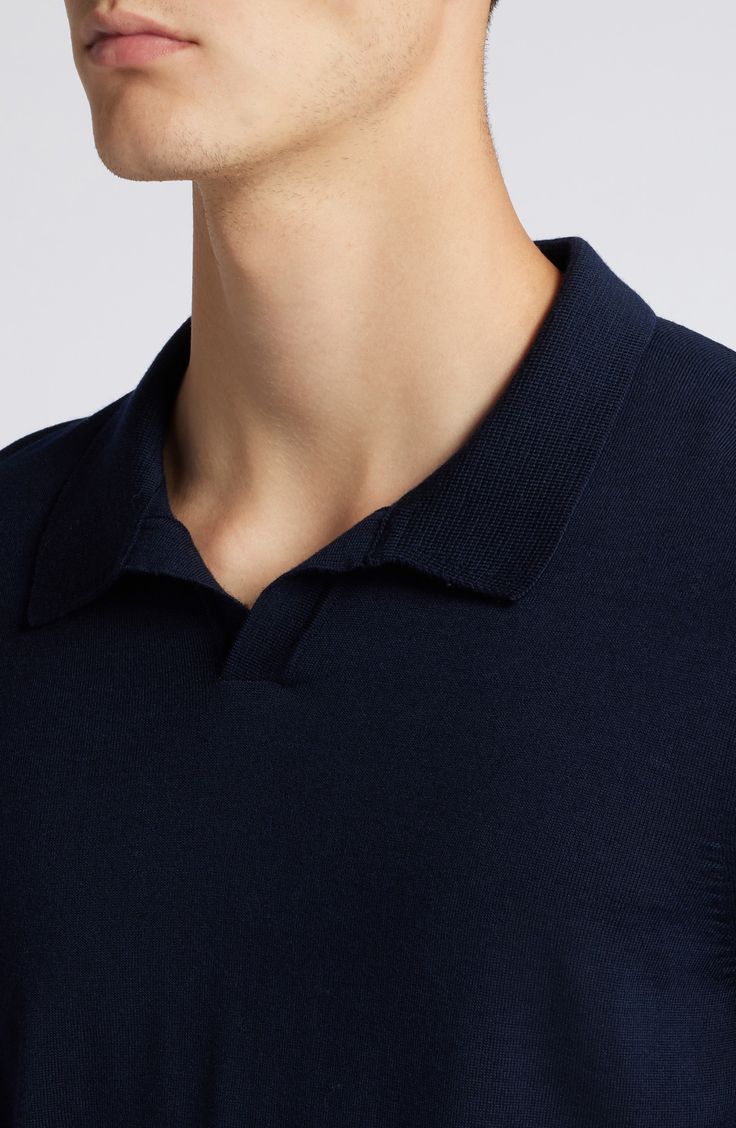 Lightweight and layerable, this polo-style sweater crafted from breathable wool features a sporty V-neck collar and a relaxed fit for day-to-night comfort. 27 1/2" length (size Medium) Johnny collar Long sleeves Ribbed cuffs and hem 100% virgin wool Machine wash, dry flat Made in Turkey Blue Polo Collar Sweater For Winter, Polo Sweater With Ribbed Collar, Casual Merino Wool Polo Sweater With Polo Collar, Navy Polo Collar Top For Winter, Casual Merino Wool Polo Sweater With Collar, Solid Polo Sweater With Ribbed Collar, Navy Polo Collar Sweater For Work, Navy Polo Sweater For Work, Classic Sweater With Polo Collar And Seamless Design