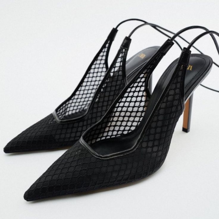 Lace Up Mesh Heels. Pointed Toes. Tied Closure At Ankle. Airfit. Technical Flexible Latex Foam Insole Designed To Offer Increased Comfort. Heel Height: 4.1 Inches (10.5 Cm) Upper 90% Polyester 10% Polyurethane Lining 100% Polyurethane Sole 100% Polyurethane Thermoplastic Black Slingback Pumps For Night Out In Spring, Black Slingback Pumps With Wrapped Heel For Summer, Black Ankle Strap Slingback Pumps For Party, Black High Heel Slingback Pumps For Evening, Black Pointed Toe Slingback Pumps For Evening, Black Slingback Pumps For Party, Zara Black High Heel Slingback Pumps, Black Ankle Strap Slingback Pumps For Evening, Zara Elegant Slingback Pumps For Summer