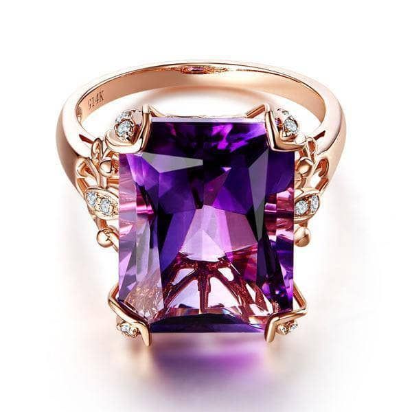 14K Rose Gold 10.5ct Purple Amethyst Natural Diamond RingThis stunning 14k Rose Gold 10.5ct Purple Amethyst Natural Diamond Ring is something to behold. The emerald cut of the purple VS1 stone radiates with sparkles, adding luxurious charm to the jewelry piece. Its high quality and gorgeousness are worth the affordable price.MATERIALSMetal: Solid 14K / 585 Rose GoldMain Stone: AmethystStone type: NaturalStone Shape: EmeraldStone Size : 12 mm x 16 mm (10.5 Carat)Stone Cut: ExcellentStone Detail: Purple Diamond Ring, Radiant Cut Rings, Wedding Anniversary Ring, Luxury Ring, Amethyst And Diamond Ring, Blood Diamond, Purple Diamond, Gold Luxury, Wedding Anniversary Rings