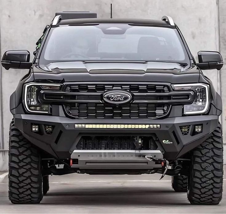 the front end of a black pickup truck