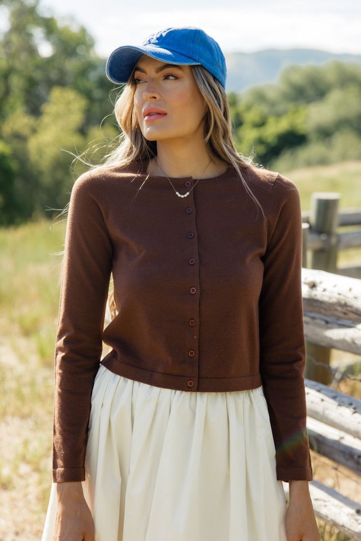 Who doesn't love a cardigan that can double as a top? The Down Bad Button Cardigan features a round neckline, functional buttons, and a cropped fit. We love it buttoned up for a fun take on a simple long-sleeve tee! soft and stretchy // paired with the bella skirt Fall Button-up Cardigan With Button Cuffs, Everyday Fall Button-up Cardigan, Fall Button-up Cardigan With Button Closure, Brown Button-up Cardigan For Fall, Everyday Button-up Fall Cardigan, Fun Cardigan, Baby Bow Hats, Down Bad, Milk Baby