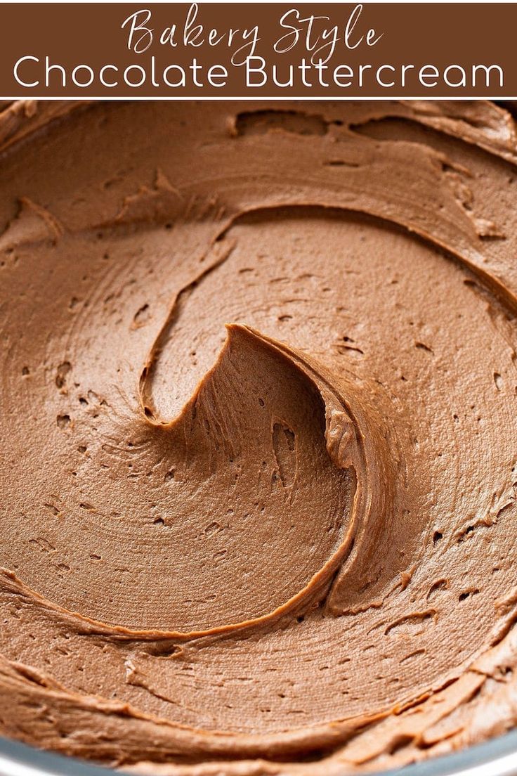 a close up of a cake batter in a pan with the words bakery style chocolate buttercream on it