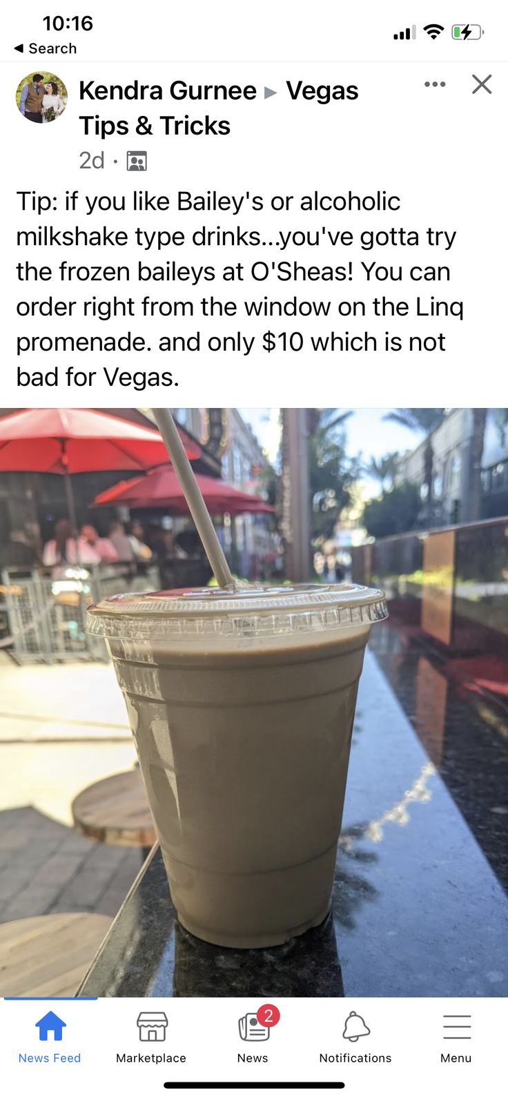 a cup with a straw in it sitting on top of a table