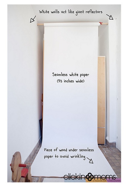 a large white sheet with words written on it sitting in front of a wooden toy horse