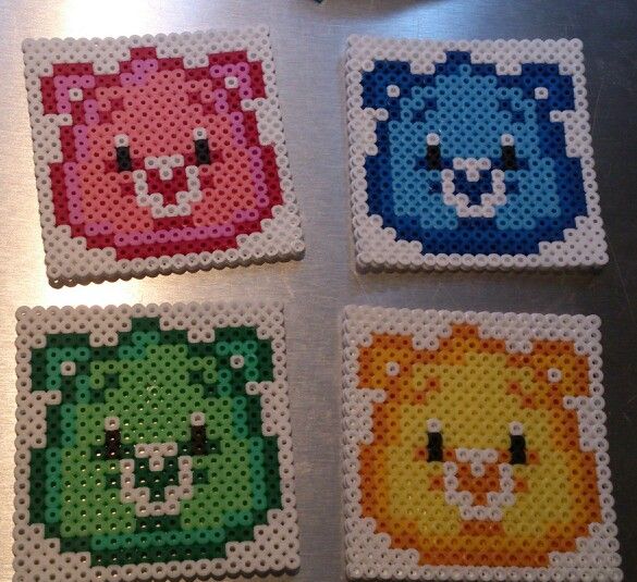 four different colored bears made out of perler beads