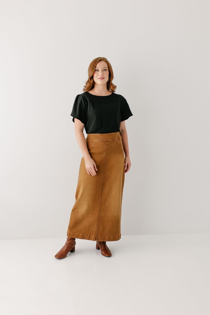 A well-loved denim skirt now in camel! Simple lines, classic, and comfortable, the 'Sara' is everything a denim skirt should be! This timeless long denim skirt is made from a soft, stretch denim that falls straight from the hips to ensure a modest and flattering fit. Featuring a wide waistband for extra comfort and ease of styling. Wear the 'Sara' comfortably from day to night with your favorite cozy sweater or a simple tee! 97% Cotton 3% Spandex Machine Wash Cold Do Not Bleach Hang to Dry Low I Everyday Fall Lined Skirt, Casual Brown Maxi Skirt For Fall, Everyday Cotton Skirt For Fall, Everyday Midi Skirt For Fall, Everyday Fall Midi Skirt, Relaxed Denim Skirt For Workwear In Fall, Relaxed Fit Maxi Skirt For Fall, Chic Relaxed Fit Everyday Skirt, Chic Relaxed Fit Skirt For Everyday