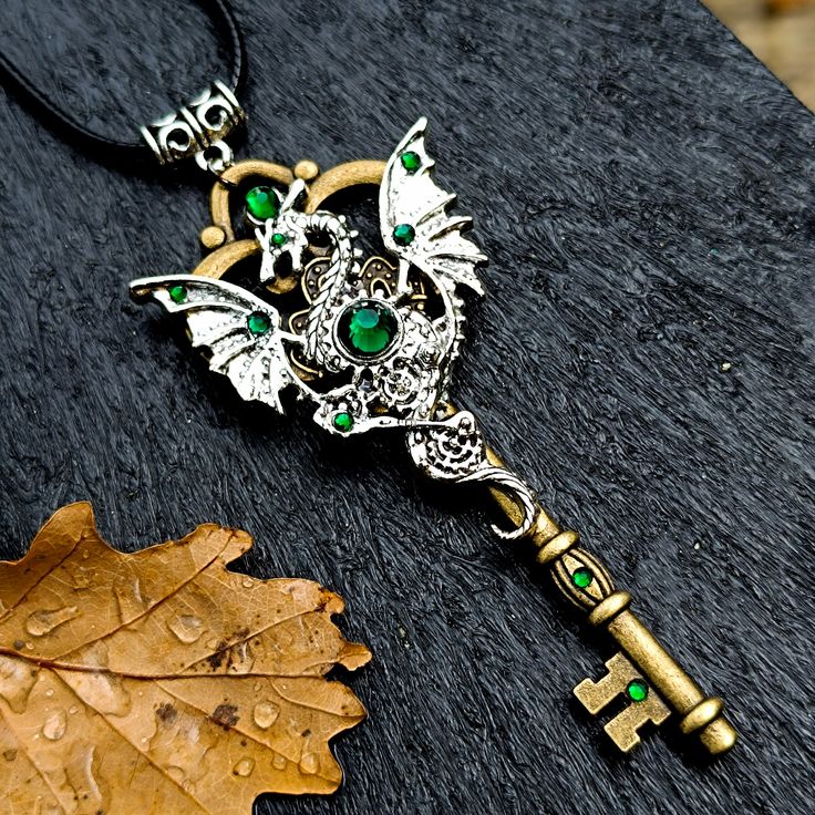 Steampunk dragon necklace. Beautiful pendant green rhinestones. Great gift for you or someone. This pendant is in stock. It will be delivered to you in the USA or Europe in +-7 days! 💌 Made with love and ready to ship. Please avoid contact with water. Punk Metal Jewelry For Fantasy Events, Halloween Fantasy Metal Jewelry, Metal Dragon Design Jewelry Gift, Gothic Jewelry Gift, Metal Jewelry With Dragon Design As Gift, Metal Jewelry With Dragon Design For Gift, Handmade Metal Necklaces For Cosplay, Handmade Metal Necklace For Cosplay, Punk Style Nickel-free Necklace For Gifting