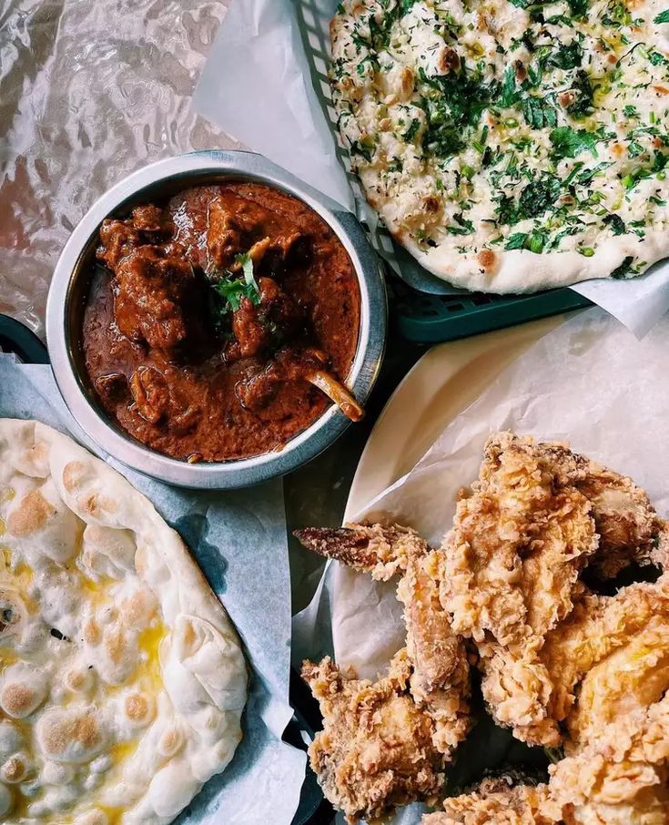 several different types of food are on the table