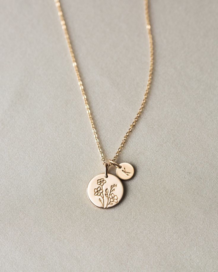 Flowers are our love language—which one speaks to you? Spotlight your favorite bloom with this floral spin on our best-selling Bennett Necklace! Make it extra meaningful with tiny add-on tags personalized with an initial or symbol. Another reason to love this piece: you can add extra initial tags as your story grows! Anniversary Jewelry With Initial Pendant And Flower Charm, Everyday Engraved Flower Pendant Jewelry, Engraved Flower Pendant Jewelry For Everyday, Nature-inspired Personalized Jewelry For Everyday, Nature-inspired Personalized Everyday Jewelry, Dainty Jewelry With Birth Flower Initial Pendant, Minimalist Jewelry With Birth Flower Initial Pendant, Dainty Initial Pendant Jewelry With Birth Flower, Dainty Birth Flower Initial Pendant Jewelry