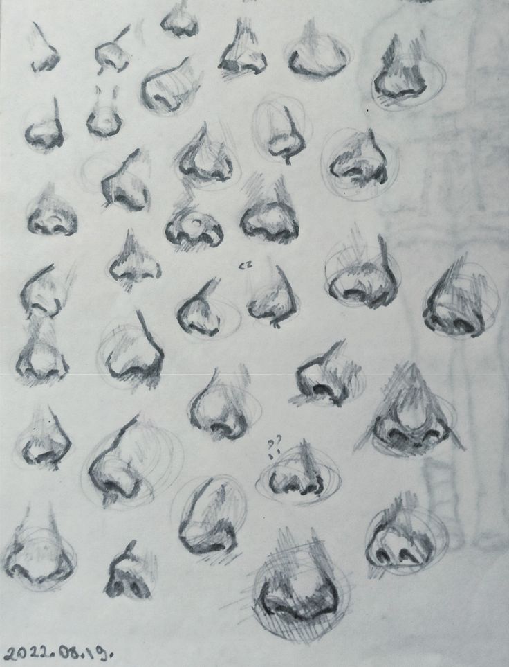 several drawings of different shapes and sizes of eyes, with one being drawn in pencil