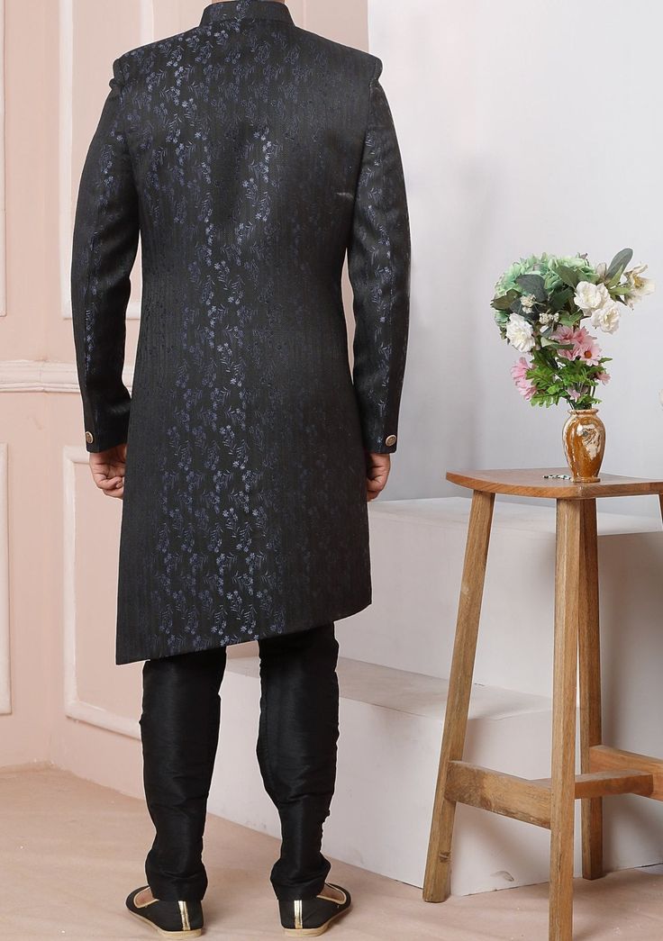 Ready-Made Sherwani With Trouser. Jacquard Brocade Fabric Top. Art Dupion Churidar Ready Made Trouser. Crafted in Chinese Collar Neck, and Full Sleeve. Satin Lining with Plain Work. High-Quality Matching Buttons. Please Note: The footwear shown in the picture is for presentation and photography purpose only. Color: There might be slight color variation due to lightings and flashes while photo shooting. The color may also vary because of different screen resolutions. Wash Care: Dry Clean Only. Fitted Nehru Jacket With Dupatta For Party, Fitted Traditional Wear For Formal Occasions, Fitted Formal Traditional Wear, Long Sleeve Brocade Kurta With Cutdana, Elegant Unstitched Art Silk Sherwani, Elegant Art Silk Sherwani, Traditional Fitted Suits For Eid, Formal Fitted Traditional Wear For Diwali, Ceremonial Brocade Churidar With Resham Embroidery