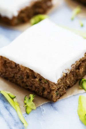 a piece of cake sitting on top of a table next to some sliced up celery