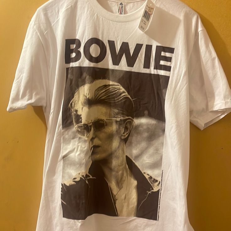 David Bowie T Shirt Xl White Band Merch Shirt With Screen Print, White Screen Print Band Merch Shirt, White Shirt With Band Merch Printing, White Crew Neck Band Merch T-shirt, White Crew Neck T-shirt Band Merch, White T-shirt With Front Print For Spring, White Relaxed Fit Shirt With Band Merch, Spring White T-shirt With Front Print, White Graphic Tee Shirt With Front Print