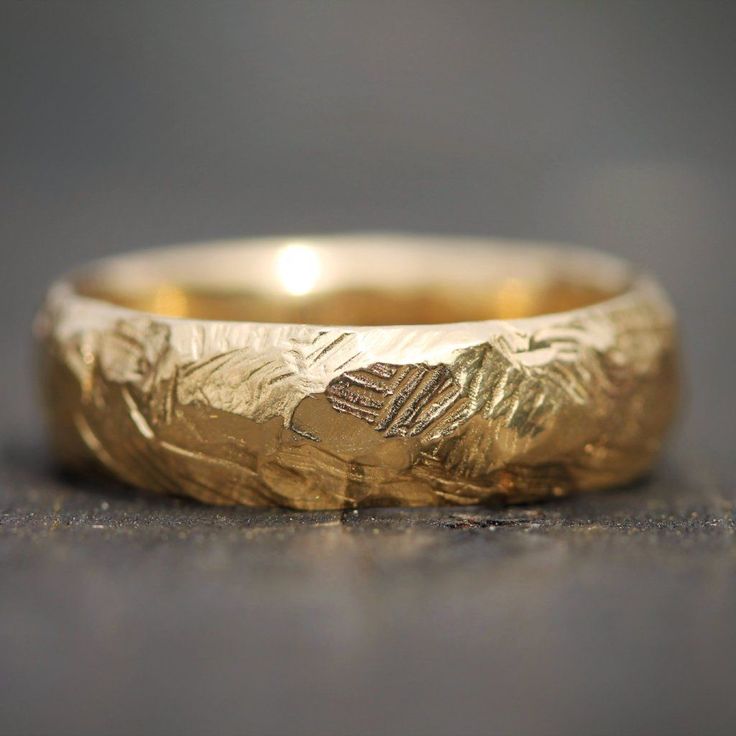 Hand-carved textured band inspired by the Rocky Mountains. Mens Jewelry Inspiration, Wedding Ring Men, Mens Wedding Rings Gold, Gold Cost, Textured Wedding Band, Contemporary Fine Jewelry, Iron Jewelry, Handmade Wedding Rings, Rustic Rings