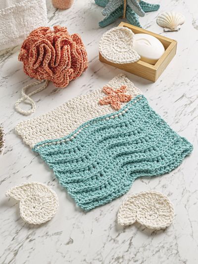 crocheted items are laid out on the table