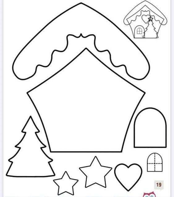 a cut out of a house with trees and stars