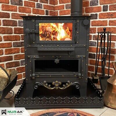 an old fashioned wood stove in front of a brick wall with other items on the floor