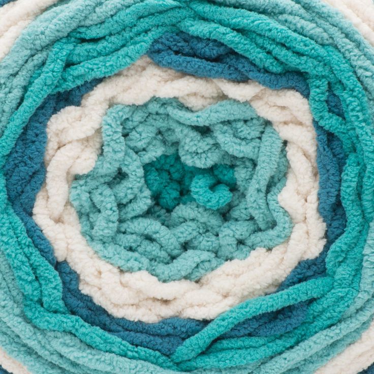 an image of a blue and white crocheted blanket