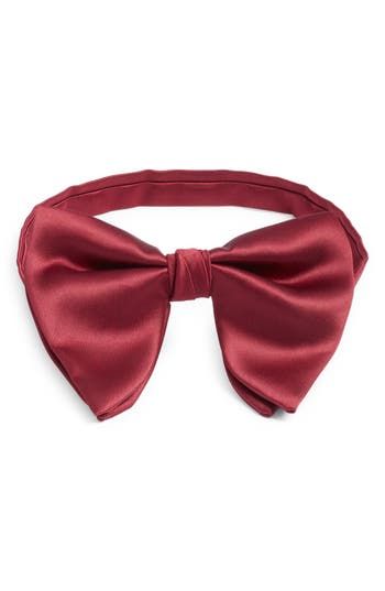 Smart and simple, this bow tie crafted from jewel-tone silk comes pre-tied with a small knot that emphasizes its classic shape. Pre-tied; adjustable 100% silk Spot clean Made in the USA of imported fabric Classic Pre-tied Butterfly Knot Bow Tie, Standard Tie Satin Bow, Pre-tied Decorative Bow Tie For Party, Elegant Solid Color Bow With Tie Back, Satin Bow Ties For Party, Satin Bow Ties For Parties, Pre-tied Bow Tie Back For Party, Pre-tied Bow Tie For Party, Solid Color Standard Tie Satin Bow