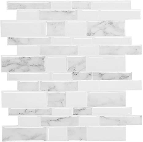 a white marble tile wall that looks like it is made out of tiles