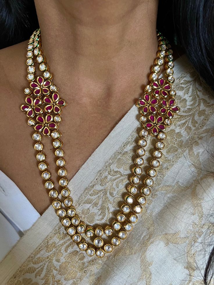 NEW ARRIVAL ♥️ Premium Quality  RESTOCKED! All our pieces are in stock and will be dispatched with in 24 to 48 hours of order. Orders received during the weekend will be dispatched on Monday.  A gorgeous Kundan jewelry piece for the gorgeous Indian bride Premium Bikaneri Kundan  You will definitely fall in love with the Kundan work crafted beautifully to make a stunning bridal piece.  Handmade by our skilled Indian craftsmen from Bikaner. One of our favorite picks for the wedding season ❤️ The statement bridal Kundan Earrings add to the royal look of the stunning necklace. The necklace comes with an adjustable string. The drop length of the necklace is 9 inches. Length of earrings: 4.5 cms Weight of earrings: 16 grams Material: Brass.Copper, silver mix, gold plating, Kundan stones, beads W Elegant Chandbali Temple Necklace For Wedding, Fusion Style Kundan Bridal Necklace With Cutdana, Fusion Kundan Bridal Necklace With Cutdana, Fusion Style Bridal Necklace With Kundan And Cutdana, Fusion Style Temple Necklace With Tilla For Wedding, Round Kundan Temple Necklace For Wedding, Kundan Temple Necklace For Wedding, Elegant Stone Work Temple Necklace For Wedding, Elegant Temple Necklace With Stone Work For Weddings