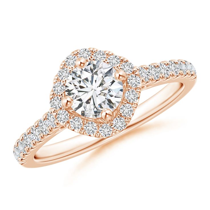 a rose gold engagement ring with diamonds on it