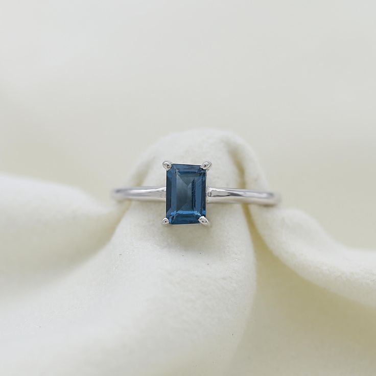 14k Gold Ring, London Topaz Gold Ring, Blue Baguette Ring, Minimalist Ring, Birthstone Ring, Blue Gemstone Ring, Personalized Gift Jewelry. ►Gemstone: London Topaz  ►Base Metal:14k Gold  ►Gross Weight - 2.5 gm ★Gemstone size: ★ Stone - 7*5 mm ★ Stone Weight- approx. 1 carat ► Band measure- ★Band measurements: approx. 1.8mm wide, approx. 1.5mm thick ♥ Packaging: All jewelry comes in a beautiful and careful packaging 🛍 If the item is going directly to the gift recipient please leave us a note dur Emerald-cut Sapphire Birthstone Ring, Blue Solitaire Emerald Cut Ring, Blue Solitaire Emerald-cut Ring, Fine Jewelry Topaz Ring With Rectangular Accent Stones, Classic Topaz Gemstone Rings, Blue Emerald Cut Ring For Birthstone, Classic Blue Topaz Ring With Rectangular Stone, Blue Emerald Cut Birthstone Ring With Prong Setting, Blue Emerald Cut Ring, Birthstone